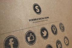 a cardboard box with some social icons on the front and side of it that says scribble social icons