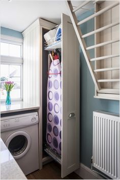 a washer and dryer in a small room