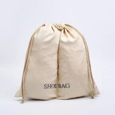 a white bag with the word shoe bag on it's front and back side