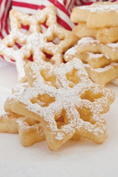 some sugar cookies are on a white plate