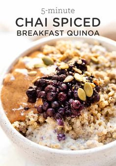 a bowl filled with oatmeal topped with blueberries and nuts