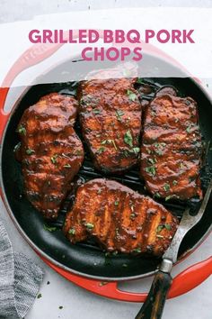 grilled bbq pork chops in a red cast iron skillet with text overlay