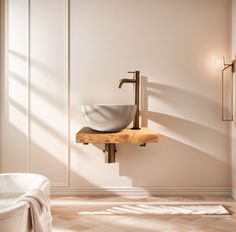 a bathroom sink sitting on top of a wooden counter