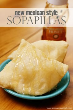 two pieces of mexican style sopapillas on a blue plate