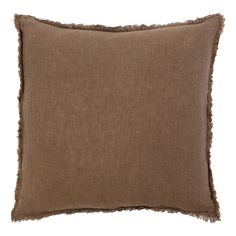 a brown pillow with fray edges on a white background