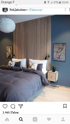 a bed room with a neatly made bed and pictures on the wall above it's headboard