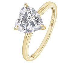 a yellow gold ring with a heart shaped diamond