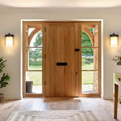 a large wooden door sitting in the middle of a room