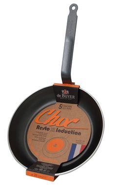 an orange and black frying pan on a white background with the words clor written in it