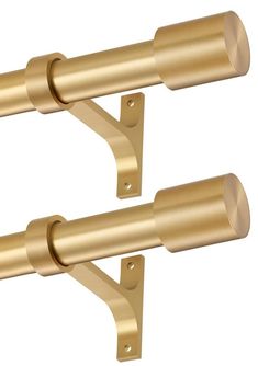 two gold metal curtain rods on a white background