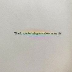 a white wall with the words thank you for being a rainbow in my life