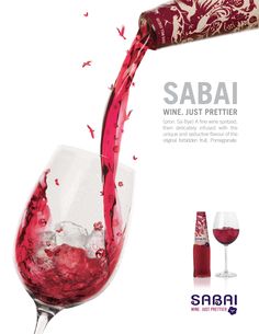 a red wine being poured into a glass with the words sabai written on it