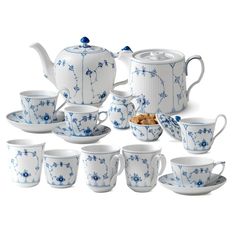 blue and white porcelain tea set with matching saucer, sugar bowl, coffee pot, mug, plate