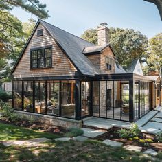 a house that is sitting in the grass