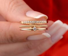 Our multi band ring is 14k solid gold. This dainty ring is a single ring that twists around to look like three bands. Each band is different from another. At the top of the two bands within three bands have zircon stones that look charming. If you think of this gold triple ring as a gift for your loved ones, it makes happy them on their birthdays, valentine's day, mother's day, anniversaries, or graduation. We can also add a gift note for your loved ones. It arrives in a special jewelry gift box Multi Band Ring, Plain Gold Ring, Triple Ring, Double Band Rings, Trio Ring, Single Ring, Zierlicher Ring, Solid Gold Ring, Eternity Band Ring