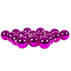 purple christmas balls are lined up in a row