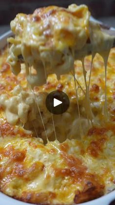 the cheese pizza is being lifted from the pan