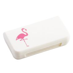 a small white box with a pink flamingo on the front and bottom part of it