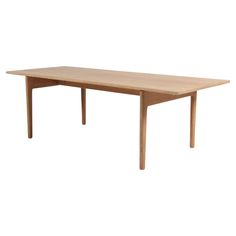 the table is made from wood and has a long, rectangular shape with two legs