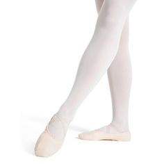 a woman in white tights and ballet shoes with her feet on the ballerina's toes