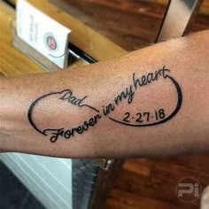 a person with a tattoo on their arm that says, i am my heart forever