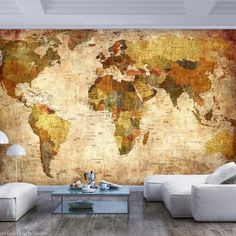 a living room with a large map on the wall and couches in front of it