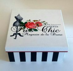 the box is decorated with black and white stripes, red roses, and an image of a teddy bear