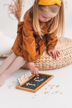 Original and Unique sand tray has many purposes: 1. Put sand in it - add wooden letters upfront and finger trace alphabet Montessori method. 2. Fill different stone beads box, add wood numbers cards upfront - you can sort stones or lay them in shapes of numbers. 3. Used it as bead tray with counting beads. Add 10 little fingers cards upfront and let kids to choose how many beads add into tray. Inspired by Montessori math gifts are well appreciated by parents, if you wish we can add PERSONALIZATI Preschool Sensory, Sand Tray, Math Gift, Laser Engraved Ideas, Eco Toys, Beaded Boxes, Waldorf Toys, Toys Kids, L Alphabet