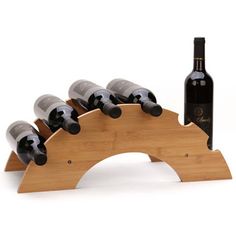 a wooden wine rack with six bottles of wine