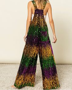 Mardi Gras Sequin Overalls.  This Mardi Gras Sequin Overalls     will have you so cute for all of the parades y’all!   Oversized fit  💜💚 💛THIS PREORDER SHIPS MID DECEMBER   📌  𝗧𝗛𝗘𝗥𝗘  𝗔𝗥𝗘  𝗡𝗢  𝗖𝗔𝗡𝗖𝗘𝗟𝗟𝗔𝗧𝗜𝗢𝗡𝗦   𝗢𝗡   𝗣𝗥𝗘𝗢𝗥𝗗𝗘𝗥  𝗜𝗧𝗘𝗠𝗦 ! 𝗪𝗲  𝗽𝘂𝗿𝗰𝗵𝗮𝘀𝗲  𝘁𝗵𝗲𝘀𝗲   𝗶𝘁𝗲m𝘀  𝗳𝗿𝗼𝗺  𝗼𝘂𝗿  𝗩𝗲𝗻𝗱𝗼𝗿  𝘄𝗵𝗲𝗻  𝘆𝗼𝘂𝗿   𝗼𝗿𝗱𝗲𝗿  𝗶𝘀   𝗽𝗹𝗮𝗰𝗲𝗱 . Mardi Gras Party Outfit College, Mardi Gras Party Outfit, Mardi Gras Dress, Party Outfit College, Long Overalls, Bride Birthday, Mardi Gras Outfits, Mardi Gras Party, New Years Dress