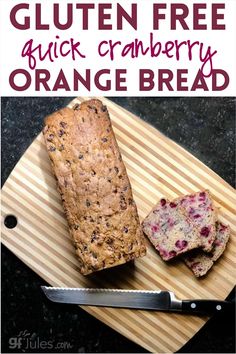 gluten free quick cranberry orange bread on a cutting board with a knife