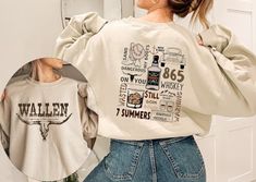 a woman wearing a sweatshirt with the words, wine and whiskey on it