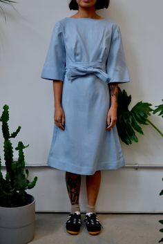 "Sixties Powder Blue Dress. Zipper Closure Up Back. Bow Belt Detail. Elbow Length Bell Sleeves. Unlined. No Content Label, Feels Like A Blend. Excellent Vintage Condition - Tiny Stain On Front. Minor Wear. Fits Size Extra Small Chest - 31\" Waist - 26\" Hip - 33\" Shoulder to Shoulder - 14.5\" Shoulder to Hem - 36\" Sleeve Length - 13\" All Sales Are Final. We have taken the time to note all size measurements and the condition of each piece so please look over all the information of the garment Powder Blue Dress, Blue Party Dress, Bow Belt, Blue Party, Dress Zipper, Powder Blue, Dress Clothes For Women, Blue Dresses, Bell Sleeves