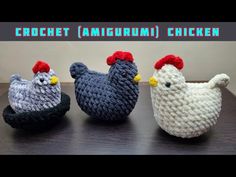 three crocheted chickens sitting on top of a table