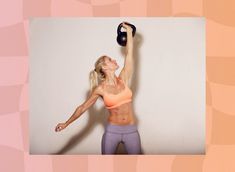 a woman holding a kettle while standing in front of a wall