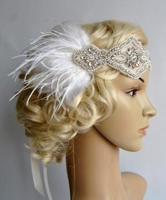 Crystal Applique Headband Beautiful Vintage Style flapper headband with feathers. Perfect for a vintage inspired bride, 1920's wedding or Great Gatsby party or any special occasions. All rhinestone headband. Glamour and stylish Made of : - delicate yet stunning high sparkle rhinestones and pearls beaded applique headband - clear and silver beading, rhinestones, crystals , pearls - set of turkey , roosters feathers and wispy ostrich plumes - satin ribbon Headband can be put down on the forehead o Gold Flapper, Crystal Headband Wedding, Gatsby Headband, 1920's Wedding, 1920s Headpiece, Headband Crystal, Great Gatsby Fashion, Flapper Headband, Beautiful Hair Accessories