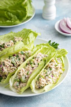 lettuce wraps filled with chicken salad on a plate