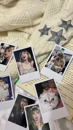 several polaroid photos are laying on top of an open book with stars above them