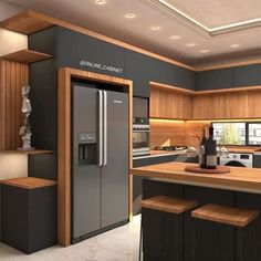 a modern kitchen with an island and refrigerator