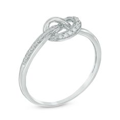 a white gold ring with an intertwined knot and diamonds on the band, set in 18k white gold