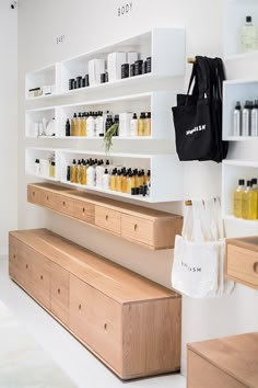 a store with shelves filled with bottles and bags