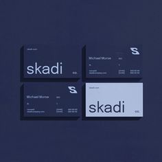 three business cards with the name skadi on them are placed next to each other