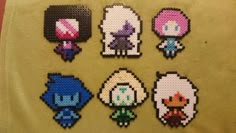 the pixel characters are all different colors and sizes