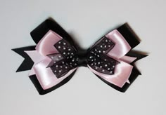 Perfect medium sized bow to accent Ballet outfits. Can be worn with casual or formal outfits. Everyday wear or special occasions. High quality, handmade hair bow. Made with satin and chiffon ribbons. Approx. size: 4.5in x 2.75in. Black Outfit Pink Accessories, Light Pink Accessories, Ballet Outfits, Black Hair Bow, Pink And Black Hair, Black Hair Bows, Outfits Everyday, Wedding Barrettes, Ballet Clothes