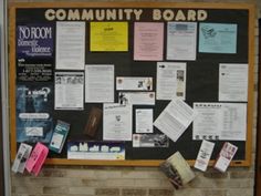 a bulletin board is covered with papers and other information about community boards on the wall