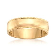 a yellow gold wedding ring on a white background