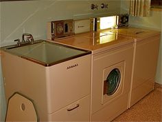 a washer and dryer in a small room