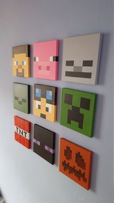 some pixel art is hanging on the wall