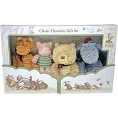 three small stuffed animals in a box on a white background with the words classic character gift set