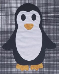 a black and white penguin with yellow feet on a gray background, it's eyes are wide open